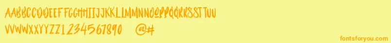 Outistyle Brush Font – Orange Fonts on Yellow Background