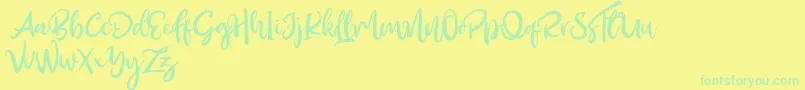 フォントOutistyle Free – 黄色い背景に緑の文字