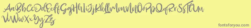 Outistyle Free Font – Gray Fonts on Yellow Background
