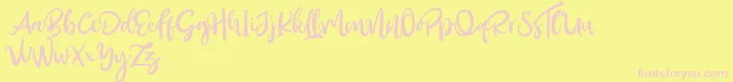 Outistyle Free-Schriftart – Rosa Schriften auf gelbem Hintergrund