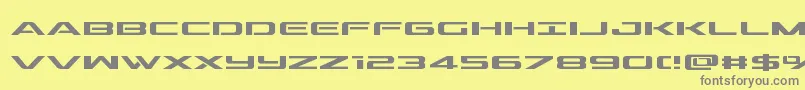 フォントoutrider – 黄色の背景に灰色の文字