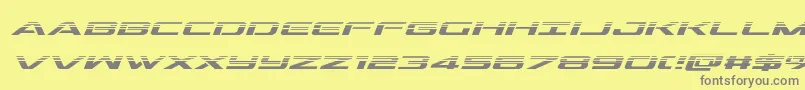 フォントoutriderhalfital – 黄色の背景に灰色の文字