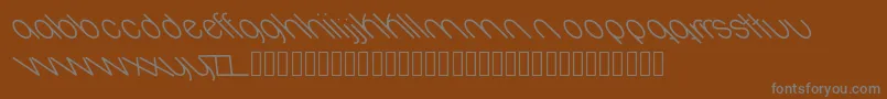 フォントOval – 茶色の背景に灰色の文字