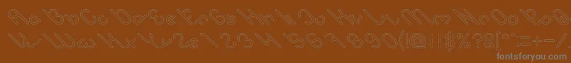 Шрифт owaikeo Hollow – серые шрифты на коричневом фоне