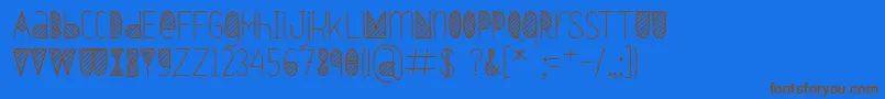 フォントOxymorons Bold – 茶色の文字が青い背景にあります。