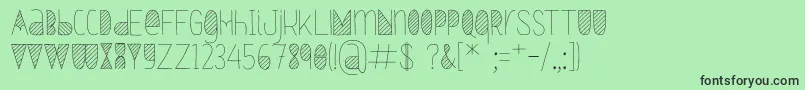 フォントOxymorons – 緑の背景に黒い文字