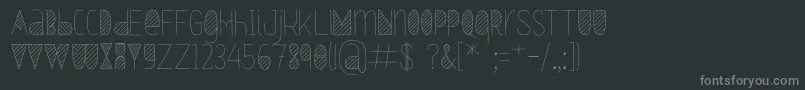 フォントOxymorons – 黒い背景に灰色の文字