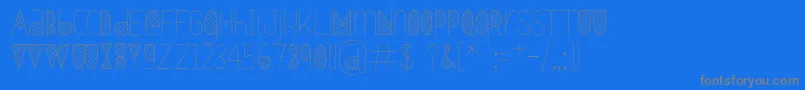 フォントOxymorons – 青い背景に灰色の文字