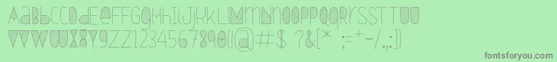 Fonte Oxymorons – fontes cinzas em um fundo verde