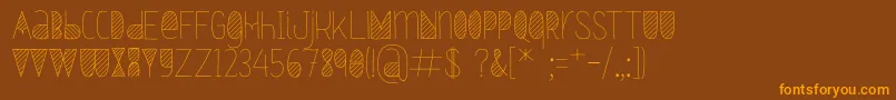 Czcionka Oxymorons – pomarańczowe czcionki na brązowym tle