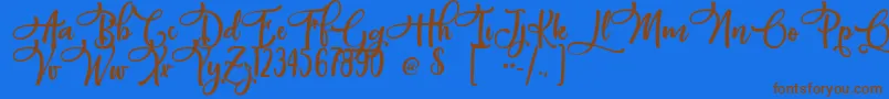 フォントPacific Again – 茶色の文字が青い背景にあります。