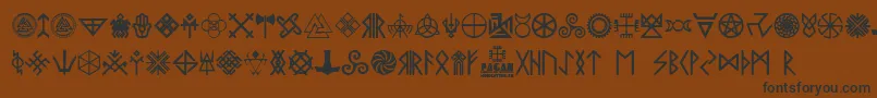 フォントPagan Symbols – 黒い文字が茶色の背景にあります
