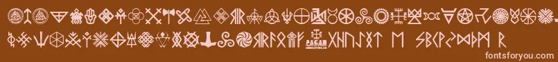 フォントPagan Symbols – 茶色の背景にピンクのフォント