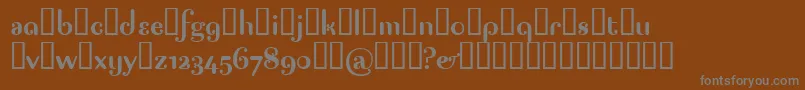 PAGAP   -fontti – harmaat kirjasimet ruskealla taustalla