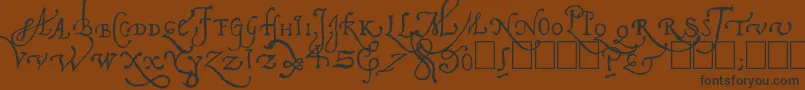 Czcionka Pal Antic – czarne czcionki na brązowym tle
