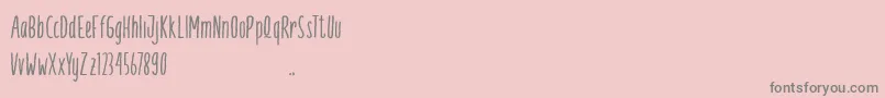 Palamia demo-Schriftart – Graue Schriften auf rosa Hintergrund