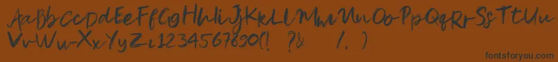 Czcionka Pandu – czarne czcionki na brązowym tle