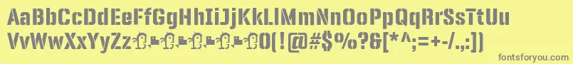 En savoir plus sur la police PanfletaStencil ExtraBold Police PanfletaStencil ExtraBold – polices grises sur fond jaune
