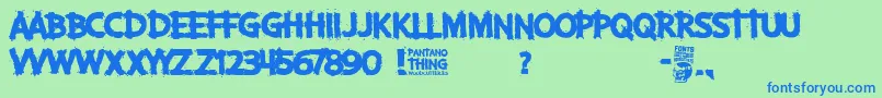 Pantano Thing-Schriftart – Blaue Schriften auf grünem Hintergrund