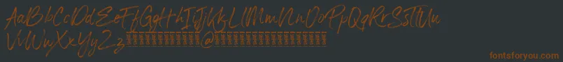 Panterick Demo Version-fontti – ruskeat fontit mustalla taustalla