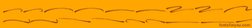 Panterick Swash-Schriftart – Braune Schriften auf orangefarbenem Hintergrund