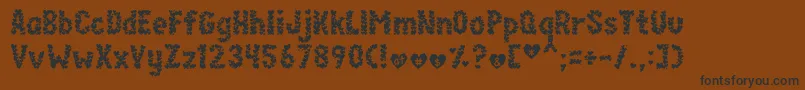 paperhearts Font – Black Fonts on Brown Background