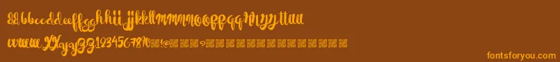 PaperScraps Font – Orange Fonts on Brown Background