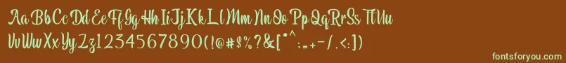 フォントPariangan – 緑色の文字が茶色の背景にあります。
