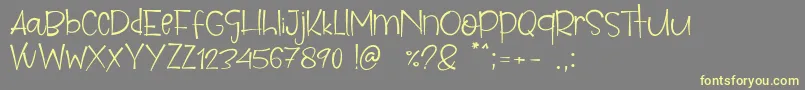 Parise Font – Yellow Fonts on Gray Background