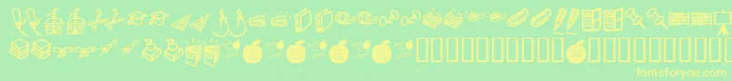 フォントKrBackToSchoolDings – 黄色の文字が緑の背景にあります