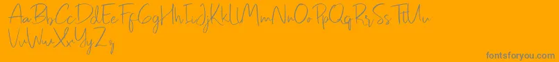 Pastelyn-Schriftart – Graue Schriften auf orangefarbenem Hintergrund