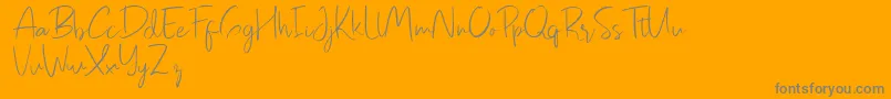 Pastelyn-Schriftart – Graue Schriften auf orangefarbenem Hintergrund