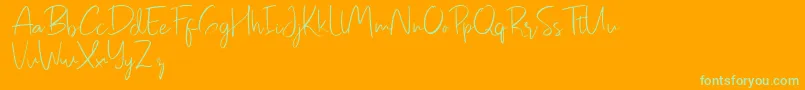Pastelyn Font – Green Fonts on Orange Background