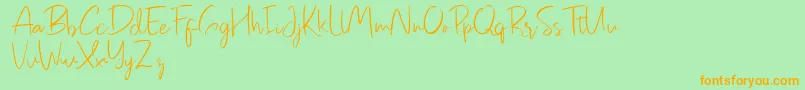 Pastelyn-Schriftart – Orangefarbene Schriften auf grünem Hintergrund