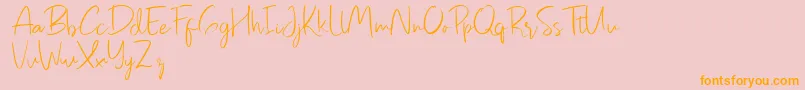 Pastelyn Font – Orange Fonts on Pink Background