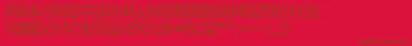 Pasto Print Light-Schriftart – Braune Schriften auf rotem Hintergrund