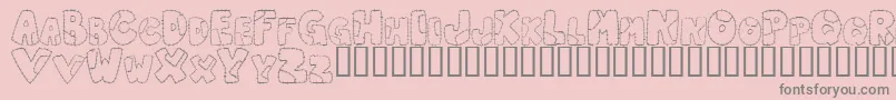 PATCL   -fontti – harmaat kirjasimet vaaleanpunaisella taustalla