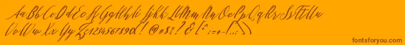 フォントPatricia Script – オレンジの背景に茶色のフォント