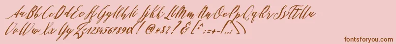 Czcionka Patricia Script – brązowe czcionki na różowym tle