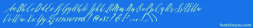 Czcionka Patricia Script – zielone czcionki na niebieskim tle