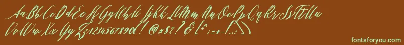 フォントPatricia Script – 緑色の文字が茶色の背景にあります。