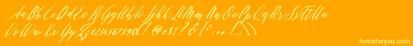 Fonte Patricia Script – fontes amarelas em um fundo laranja