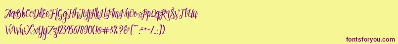 Patronia Script Font – Purple Fonts on Yellow Background