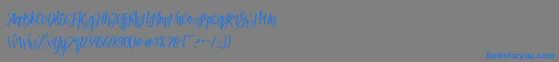 Patronia Script-Schriftart – Blaue Schriften auf grauem Hintergrund