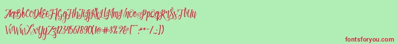 Patronia Script Font – Red Fonts on Green Background