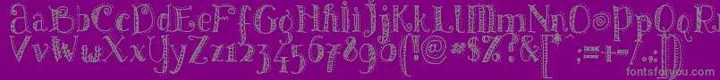 フォントPATTD    – 紫の背景に灰色の文字