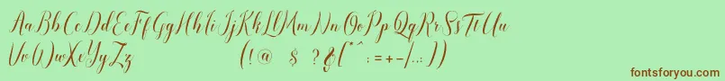 Fonte pauline script – fontes marrons em um fundo verde