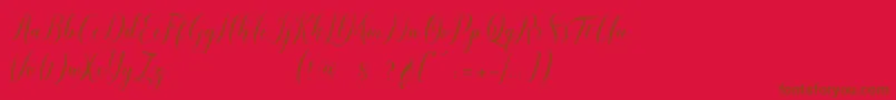 pauline script-Schriftart – Braune Schriften auf rotem Hintergrund