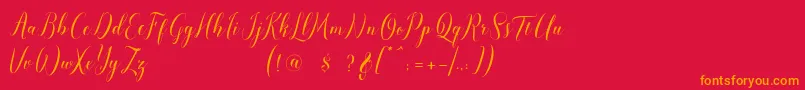 pauline script-Schriftart – Orangefarbene Schriften auf rotem Hintergrund
