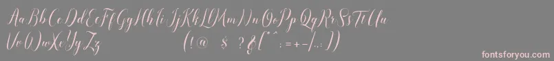 Czcionka pauline script – różowe czcionki na szarym tle
